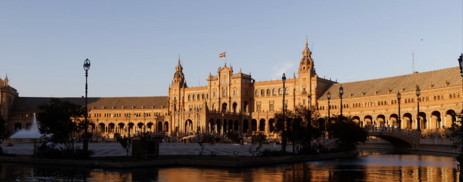 Plaza de España in Seville lit by warm sunset light